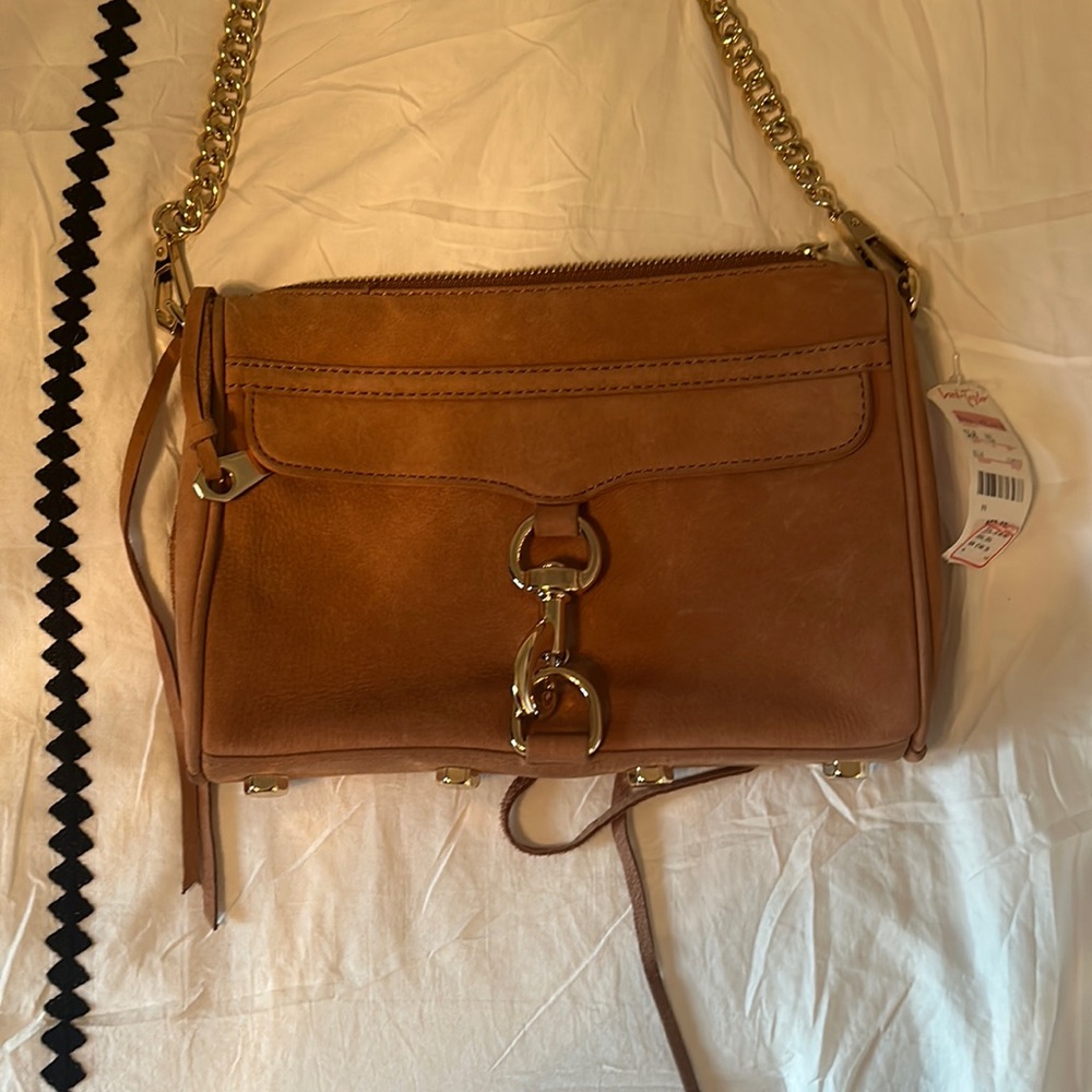 Rebecca Minkoff brown suede cross body purse.   Never used.  Tag from L&T on
